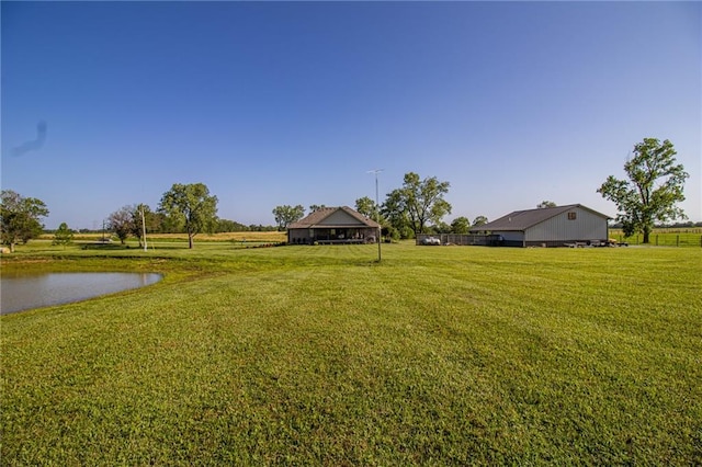 view of yard with a water view