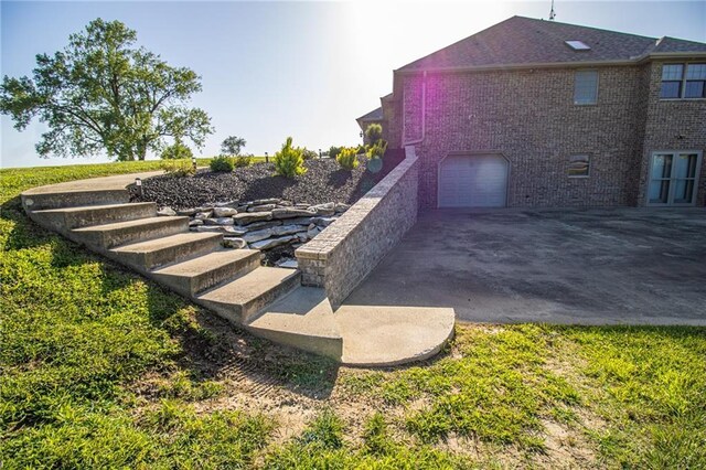 exterior space with a garage