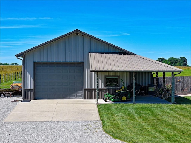 exterior space featuring a front yard and a garage