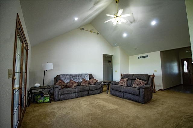 living room featuring ceiling fan, carpet flooring, and high vaulted ceiling