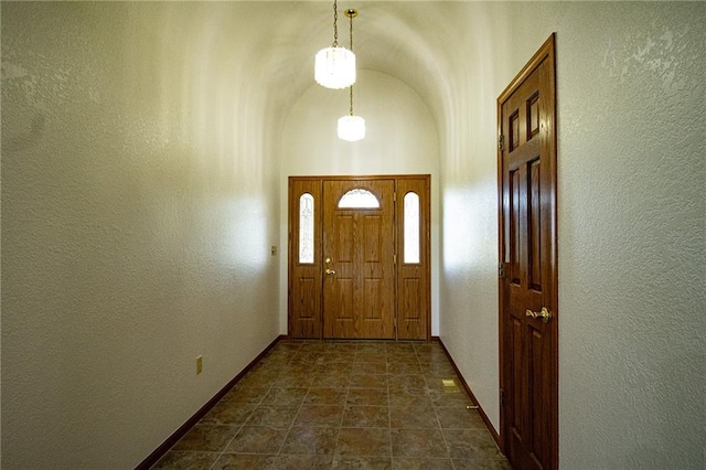 entryway with lofted ceiling