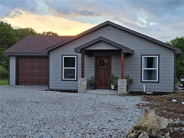 view of front of property with a garage