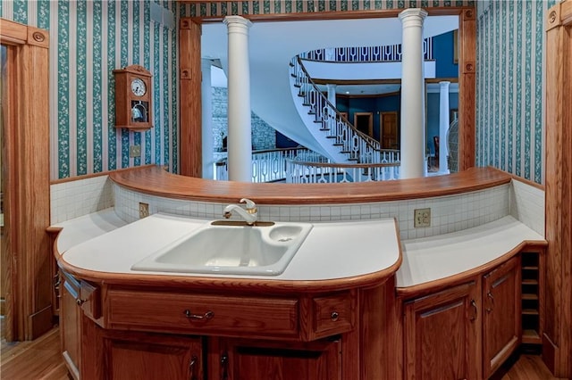 bar with ornate columns and sink