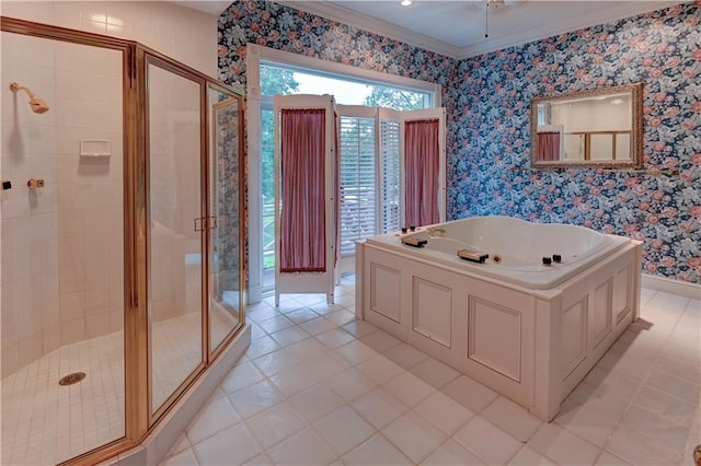 bathroom with ornamental molding and shower with separate bathtub