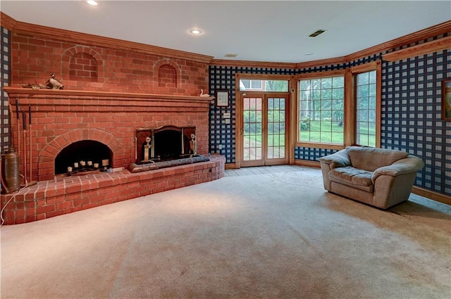 living room featuring ornamental molding, carpet flooring, french doors, and a fireplace