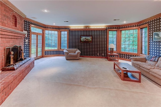 carpeted living room with ornamental molding and a fireplace