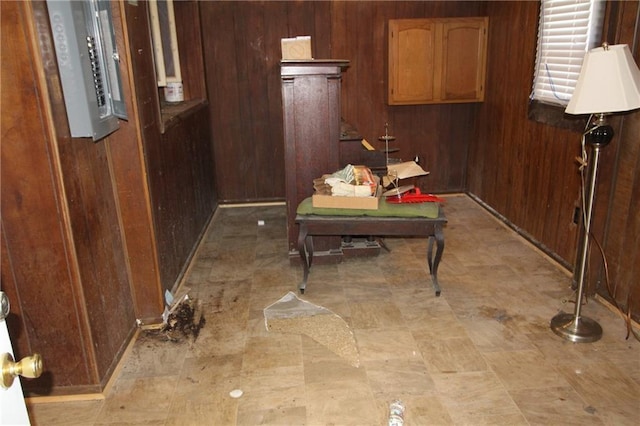 interior space featuring wood walls