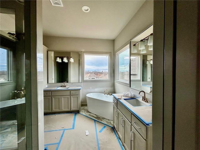 bathroom featuring a bathtub and vanity