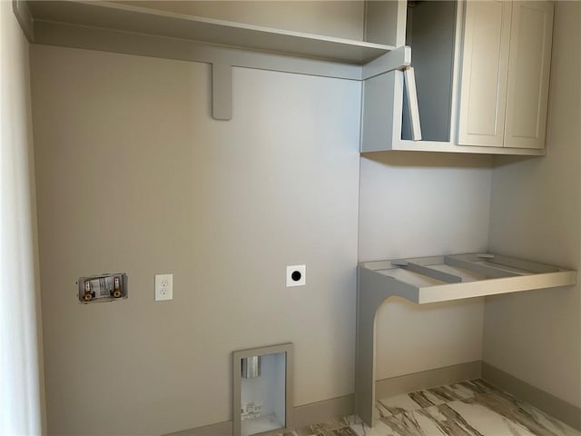 laundry area with cabinet space, baseboards, marble finish floor, hookup for an electric dryer, and washer hookup