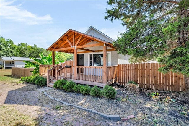 view of front of home with a wooden deck