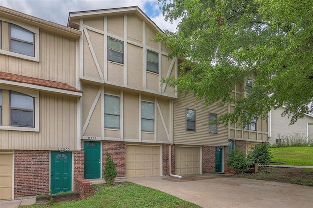 multi unit property featuring a garage