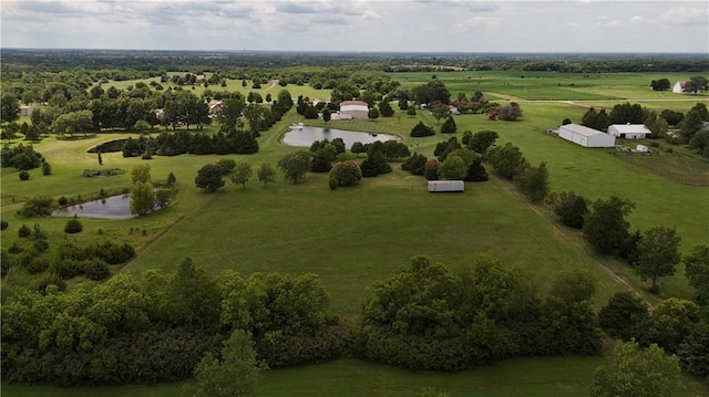 aerial view with a rural view and a water view