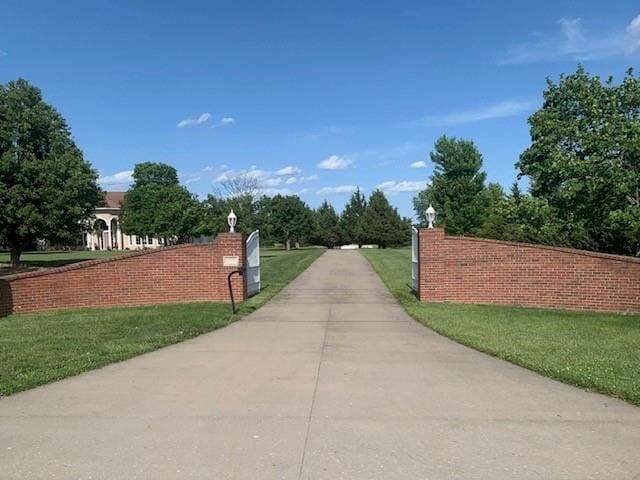 surrounding community featuring a yard