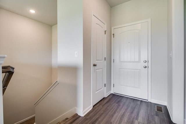 doorway to outside featuring dark hardwood / wood-style floors