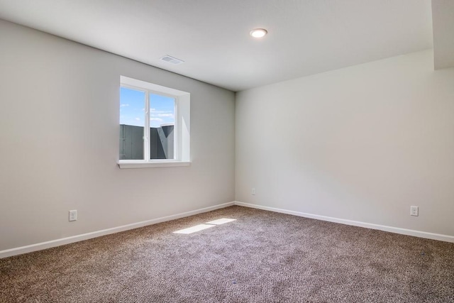 view of carpeted spare room