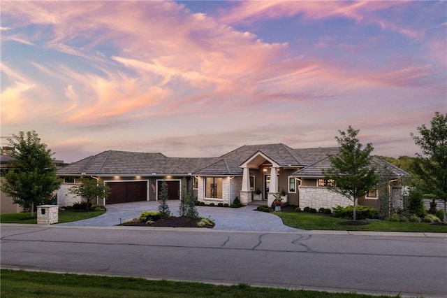 view of front of home with a garage