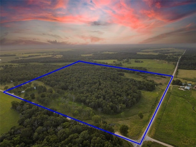 aerial view at dusk with a rural view