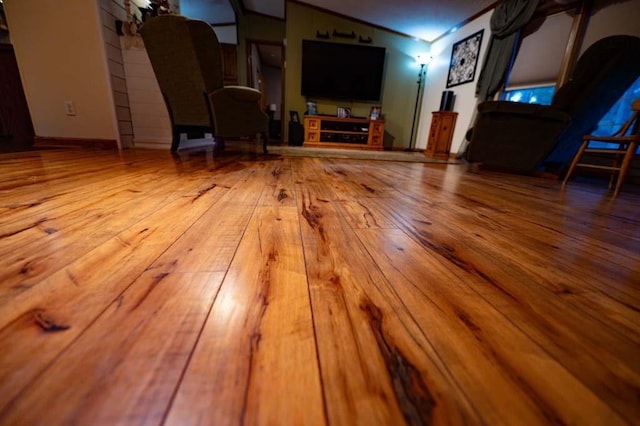 unfurnished living room featuring lofted ceiling and light hardwood / wood-style flooring