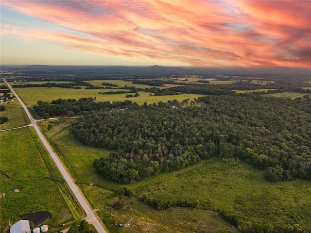 aerial view at dusk with a rural view