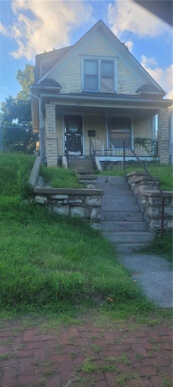 bungalow-style house featuring covered porch