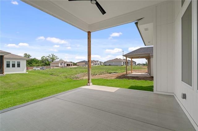 view of patio / terrace featuring ceiling fan