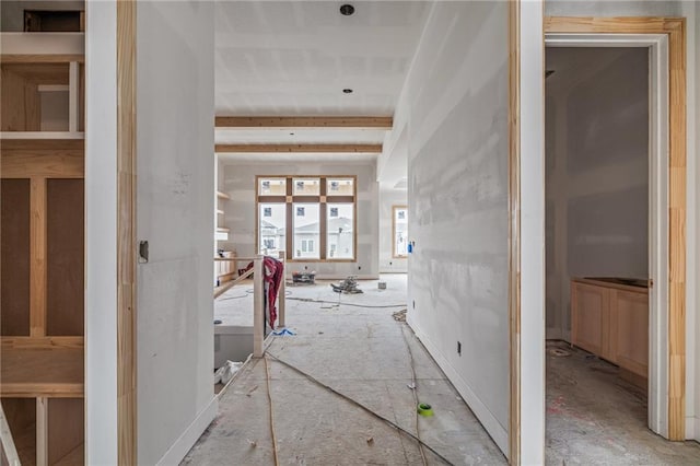 interior space with beamed ceiling