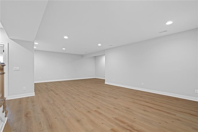 unfurnished living room with light hardwood / wood-style floors