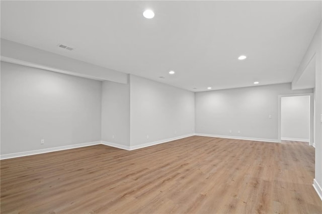 empty room with light wood-type flooring