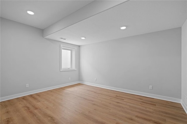 unfurnished room featuring light hardwood / wood-style flooring