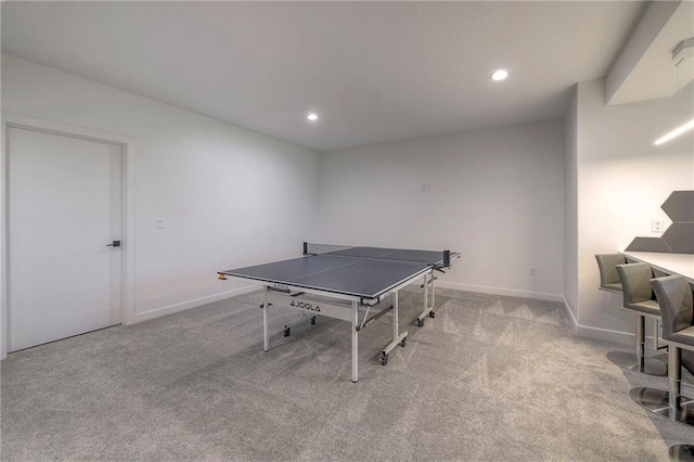 recreation room with light carpet