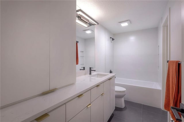 full bathroom with vanity, shower / bathing tub combination, tile patterned floors, and toilet