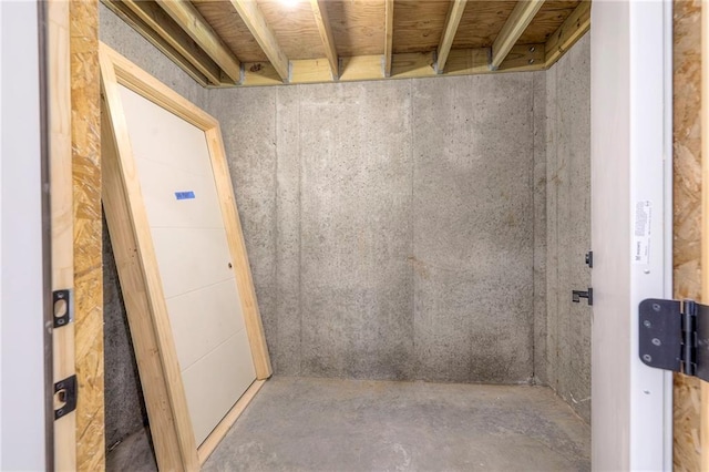 bathroom with concrete flooring