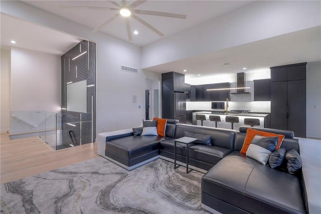 living room with light hardwood / wood-style flooring