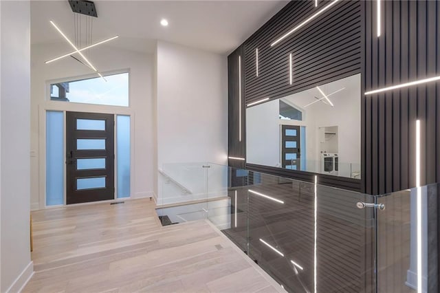 entryway with light hardwood / wood-style flooring