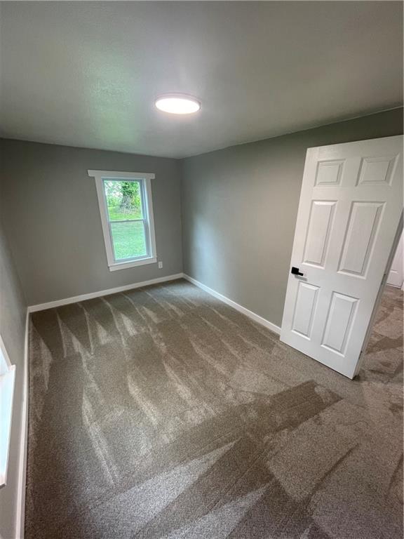 view of carpeted spare room