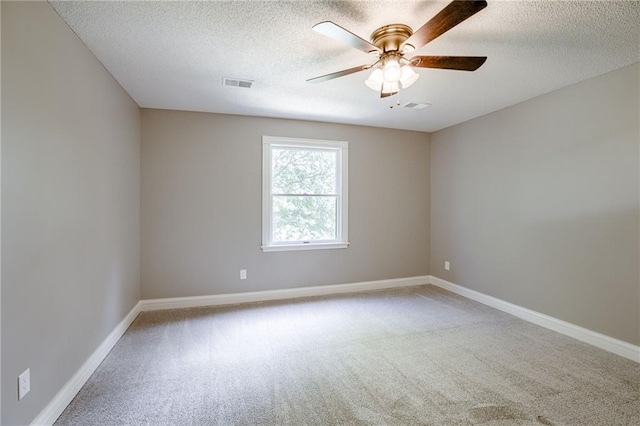 12815 NW 145th St, Platte City, MO 64079 - carpeted spare room with baseboards, ceiling fan, and visible vents