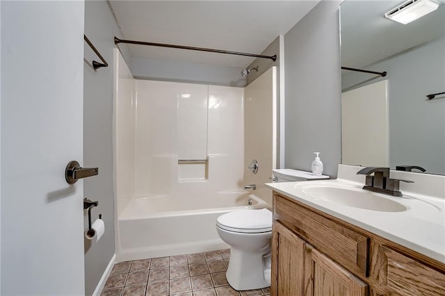 full bathroom featuring vanity, bathtub / shower combination, and toilet