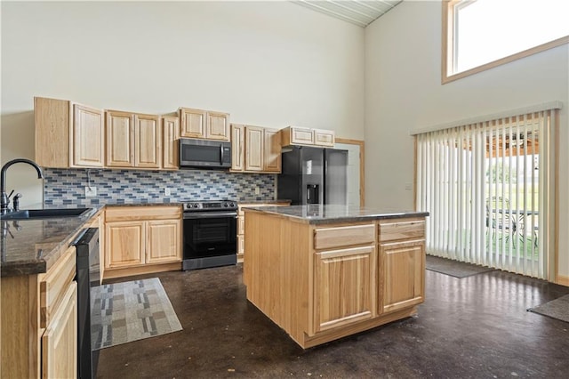 kitchen with backsplash, black appliances, light brown cabinetry, sink, and high vaulted ceiling