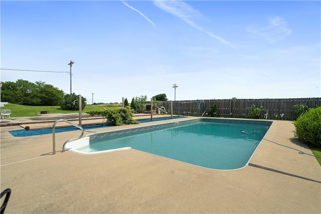 view of swimming pool featuring a patio