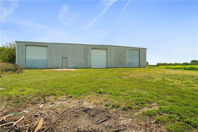 view of outdoor structure featuring a garage