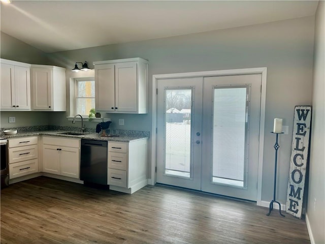 kitchen with sink, light stone counters, dark hardwood / wood-style flooring, dishwasher, and white cabinets