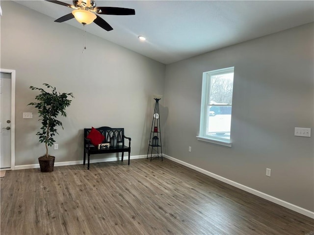 unfurnished room featuring ceiling fan and wood-type flooring