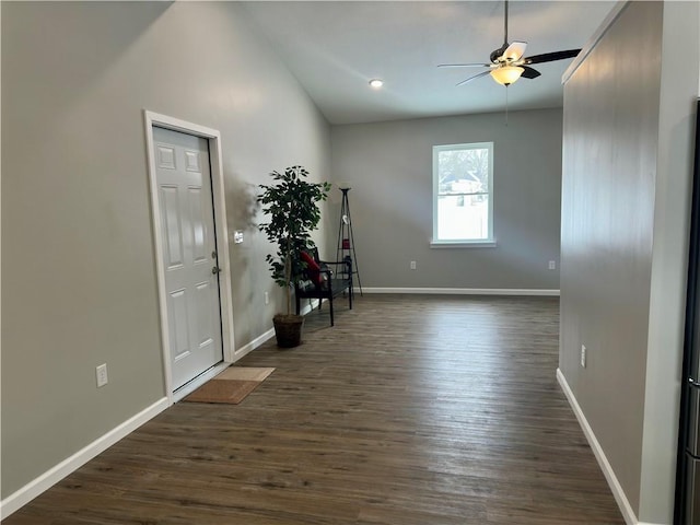 entrance foyer featuring dark wood-type flooring and ceiling fan