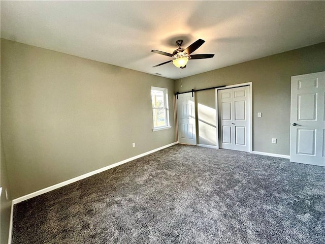 unfurnished bedroom with a closet, ceiling fan, and carpet