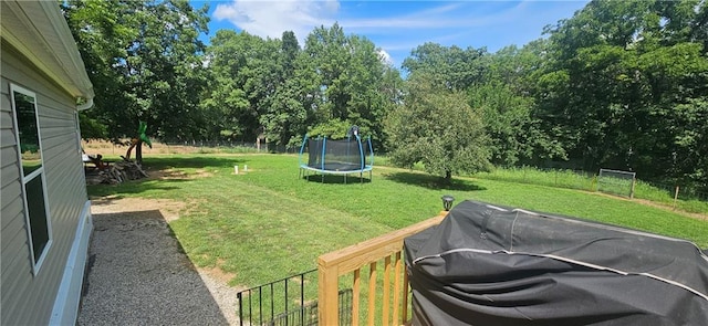 view of yard featuring a trampoline