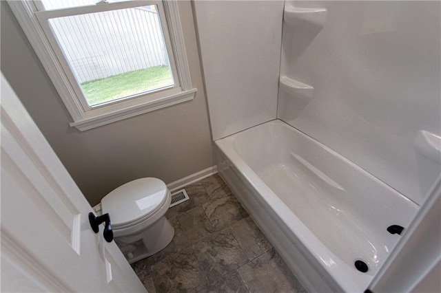 bathroom featuring toilet, baseboards, and visible vents