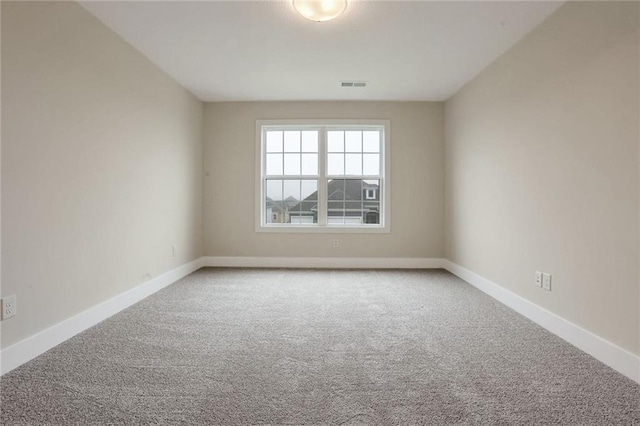 view of carpeted spare room