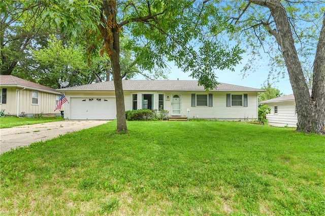 ranch-style home with a front yard and a garage