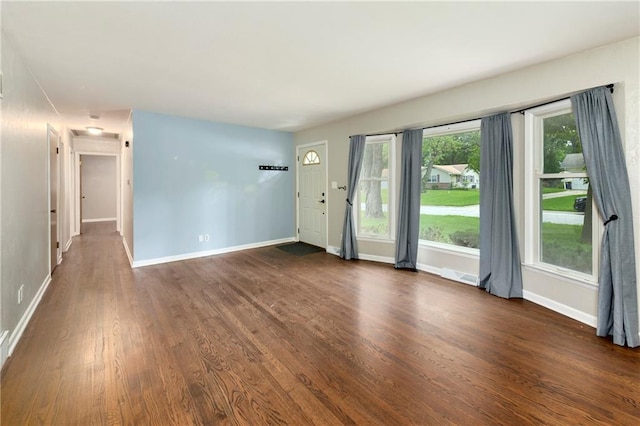 interior space with dark hardwood / wood-style floors