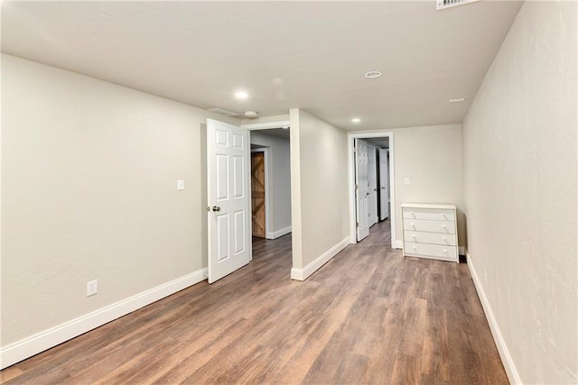 unfurnished bedroom featuring hardwood / wood-style floors